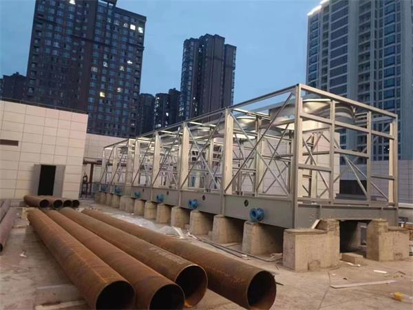 夏季冷卻塔溫度高，很難冷卻怎么辦？(冷卻塔放在車間好